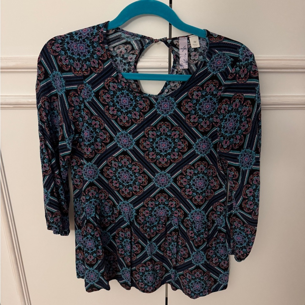 Francesca’s shirt